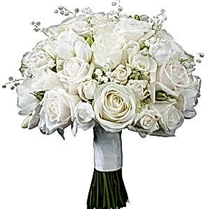 white-roses-with-lily-of-valley-bridal-bouquet-961654.jpg